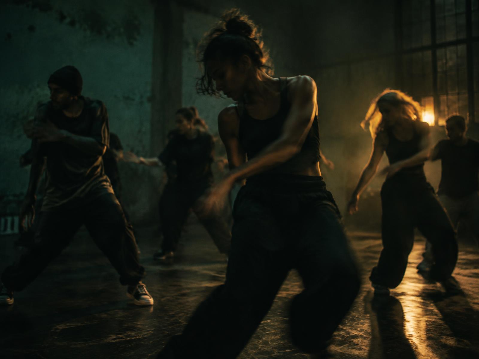 Adults moving together in a Birmingham studio